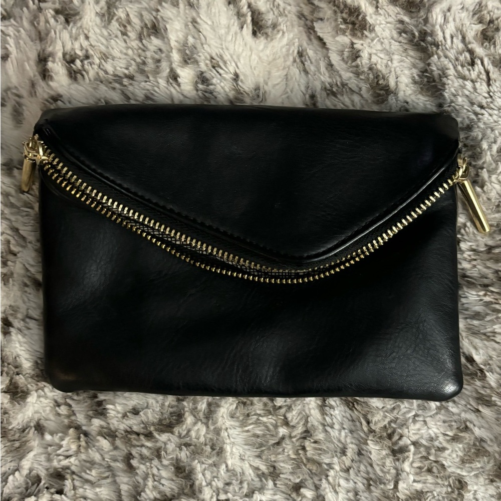MMS Handbag Clutch- never been used beautiful black leather with gold zipper